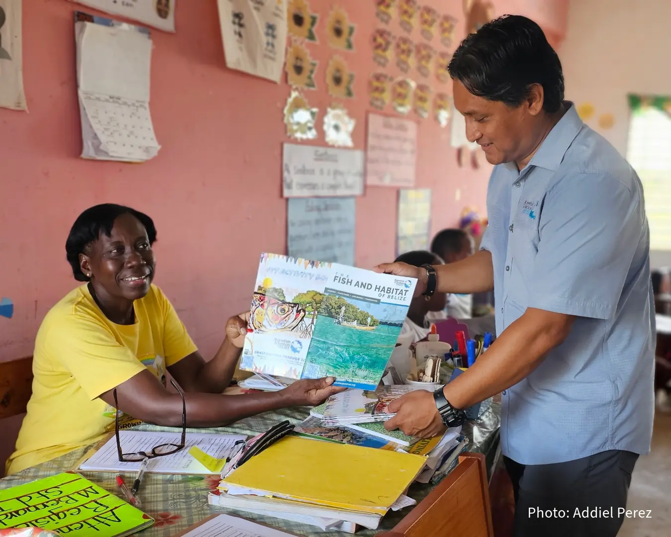 Teacher with workbook